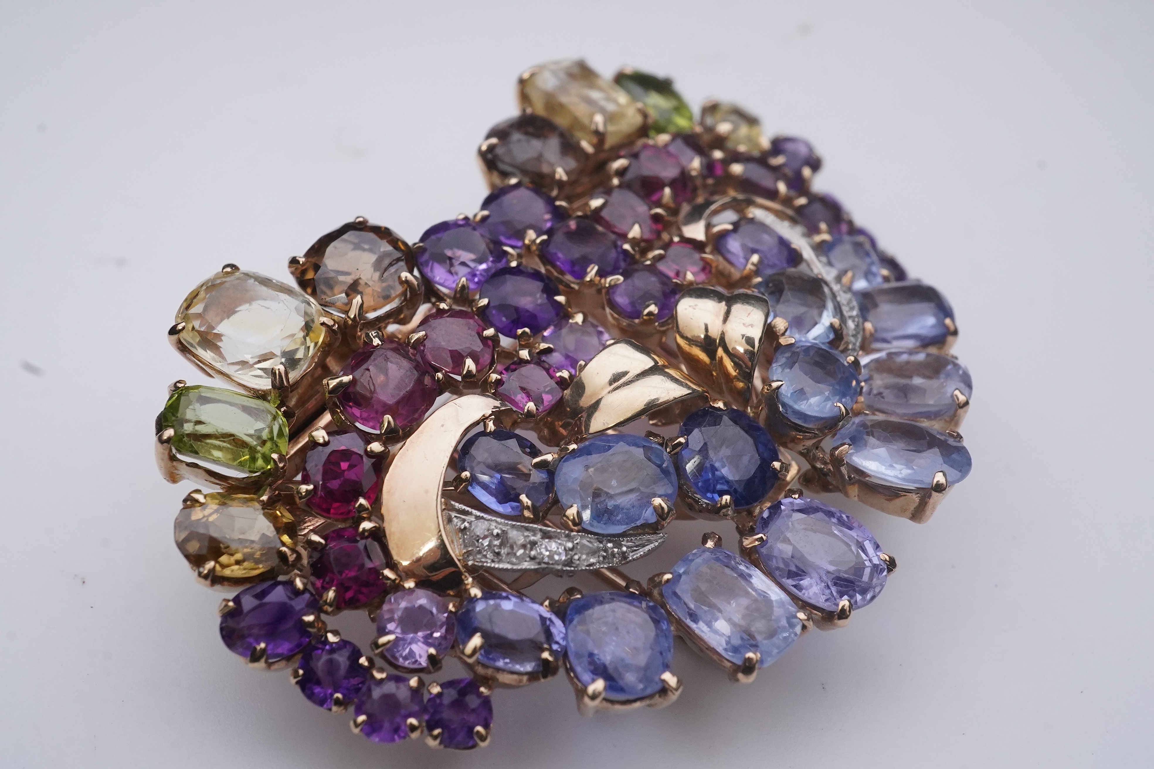 A Retro sapphire and multi-gem double clip brooch, circa 1940